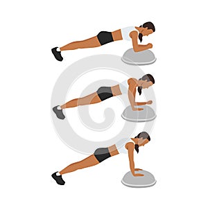 Woman doing bosu ball plank to push up or walking plank up downs