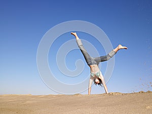 Woman Doing Cartwheel photo