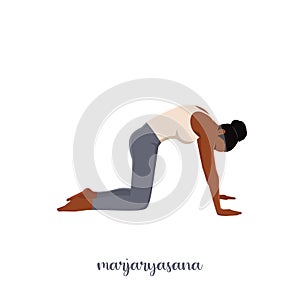 Woman doing Cat yoga pose. Marjaryasana