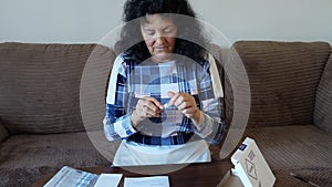 Woman doing coronavirus Covid-19 test at home 1 Swabbing