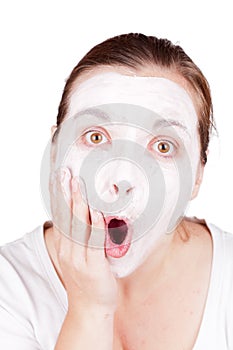Woman doing cosmetic mask