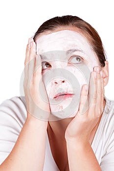 Woman doing cosmetic mask