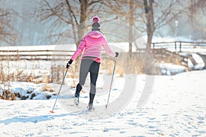 Woman doing cross country skiing as winter sport