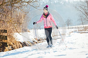 Woman doing cross country skiing as winter sport