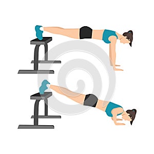 Woman doing decline push ups exercise