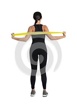 Woman doing exercise with fitness elastic band on white background, back view