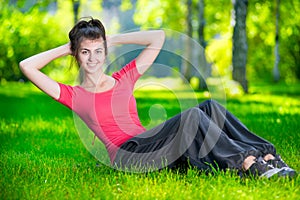 Woman doing exercises for abdominal muscles