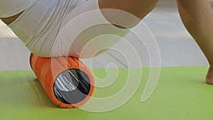 Woman doing exercises Foam Roller