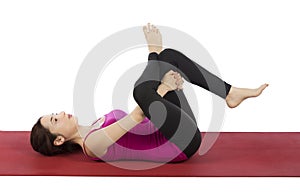 Woman doing Eye of the Needle Pose