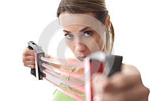 Woman doing fitness exercise with rubber band