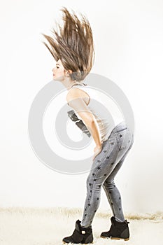 Woman doing hair flick photo