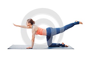 Woman doing Hatha yoga asana isolated