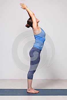 Woman doing Hatha Yoga asana Tadasana