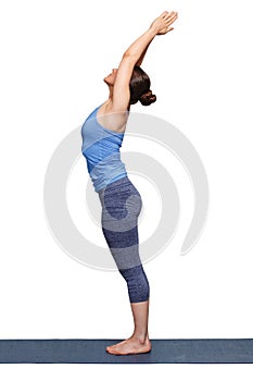 Woman doing Hatha Yoga asana Tadasana photo