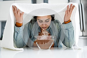 Woman Doing Inhalation Alternative Herbal Medicine