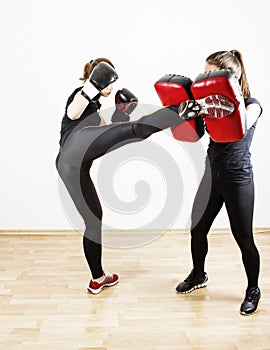 Woman doing kick boxing