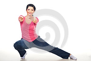 Woman doing lateral lunge photo