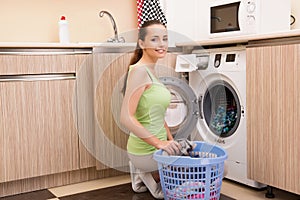 The woman doing laundry at home