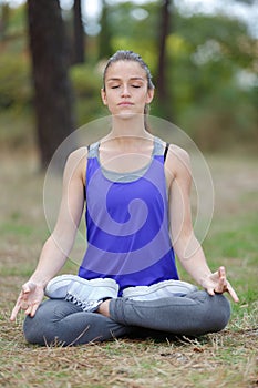 Woman doing lotus yoga posture