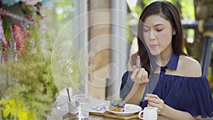 Woman doing make-up with lipstick