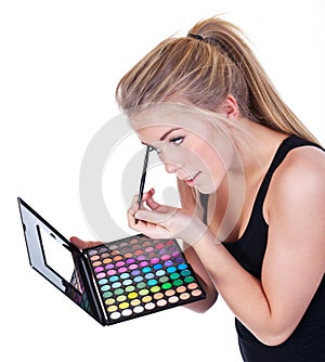 Woman doing makeup