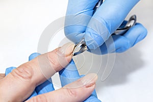 Woman doing manicure beauty salon