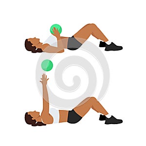 Woman doing Medicine ball floor press. Laying chest passes photo