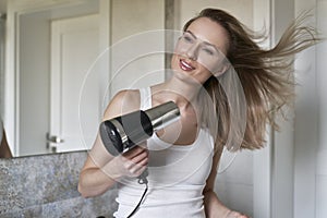 Woman doing morning rutine at bathroom