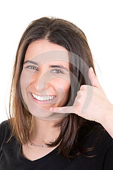 Woman doing phone gesture call me back with hand and fingers like talking on phone isolated on white background