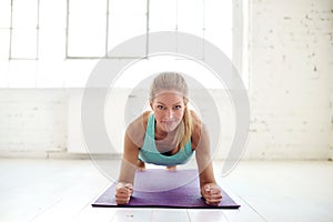 Woman doing plank exercises