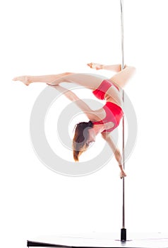 Woman doing pole dance, isolated on white
