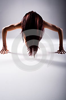 Woman doing press or push ups