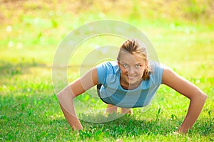 Woman doing push up exercise