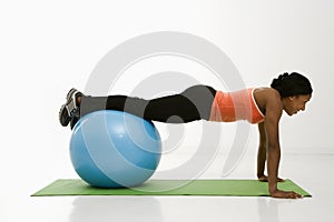 Woman doing push ups.