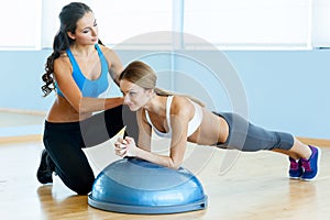 Woman doing push-ups.