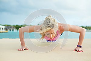 Woman doing pushups exercise