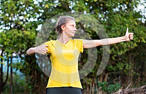 woman doing qi gong outdoors photo