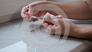 A woman doing a rapid test at home to determine the coronavirus, COVID 19