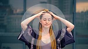 Woman doing self head massage closeup