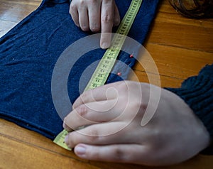 Woman doing sewing work from home photo