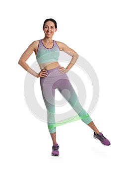 Woman doing sportive exercise with fitness elastic band on white background