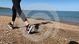 Woman doing sports on the beach