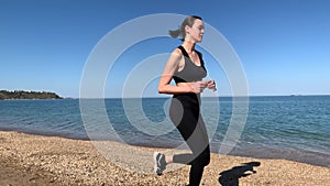 Woman doing sports on the beach