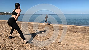 Woman doing sports on the beach