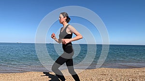 Woman doing sports on the beach