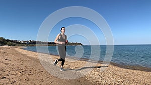 Woman doing sports on the beach