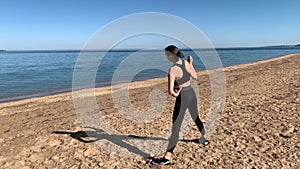 Woman doing sports on the beach