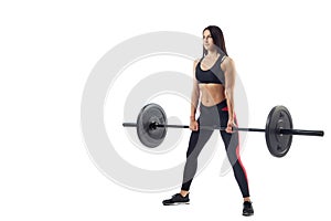 Woman doing squat with barbell