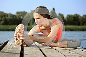 Woman doing stretching exercis