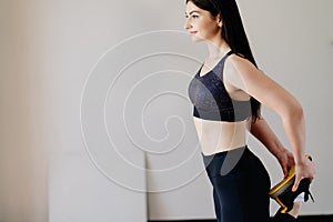 Woman doing stretching exercise warming up muscles